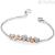 Bracelet Roberto Giannotti GIA336 hearts and angel in white and rosé silver with zircons.